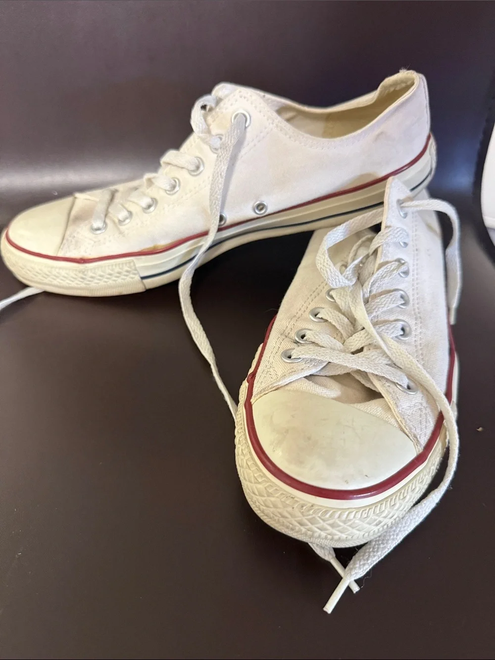 Converse Low Top Sneakers in White with Red Trim